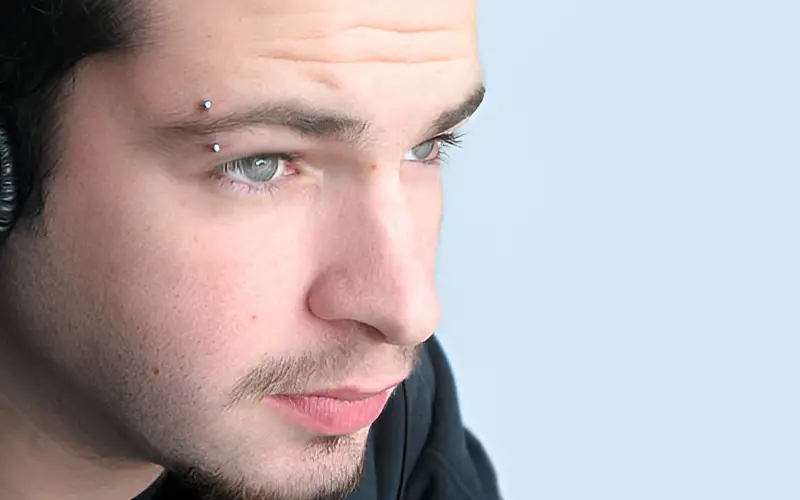 men Eyebrow Piercing